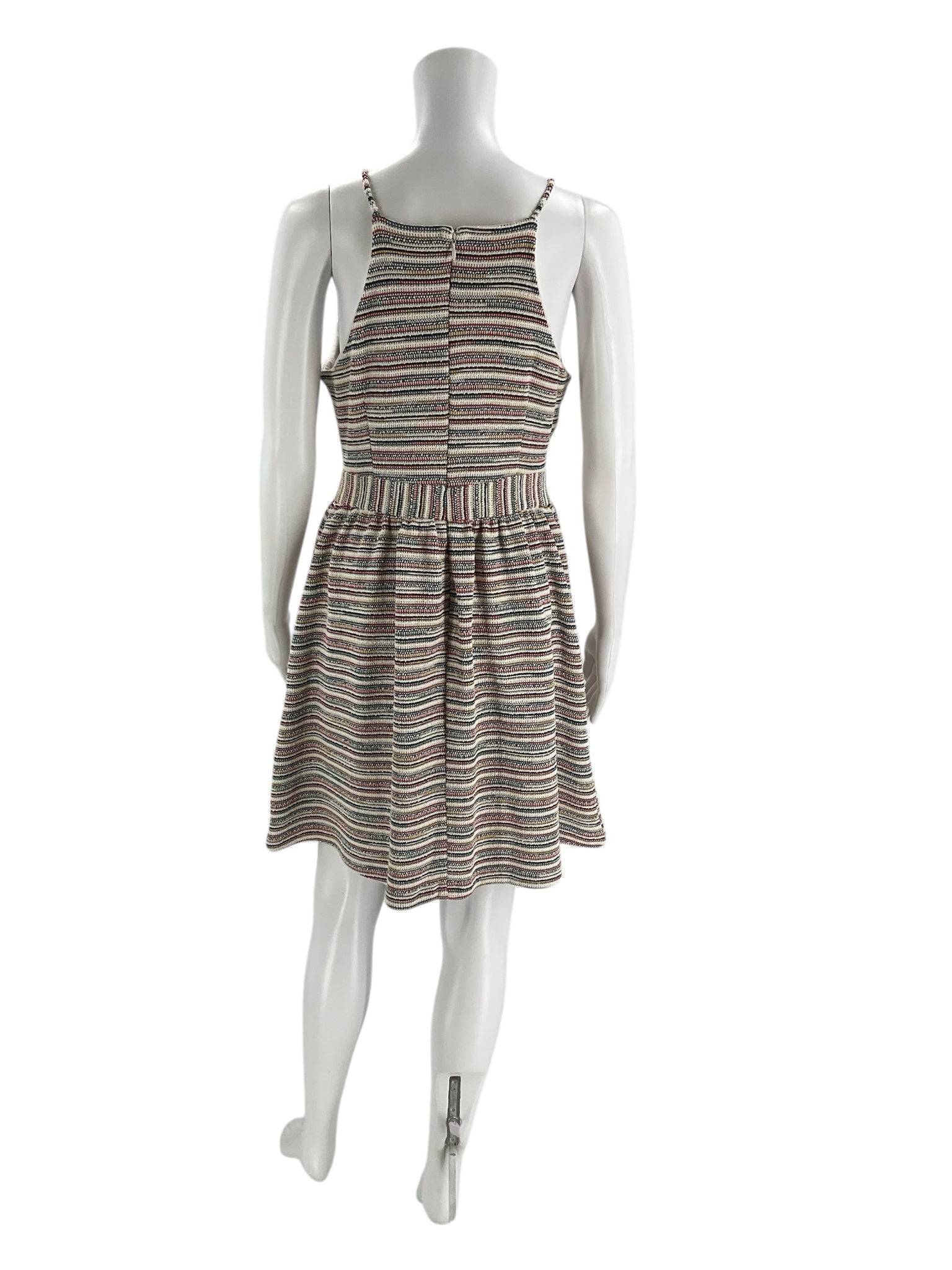 Back view of Banana Republic Dress Size 8 Petite in cream/multi knit with zipper closure and flared skirt, listed on Margaret's Fine Consignments.