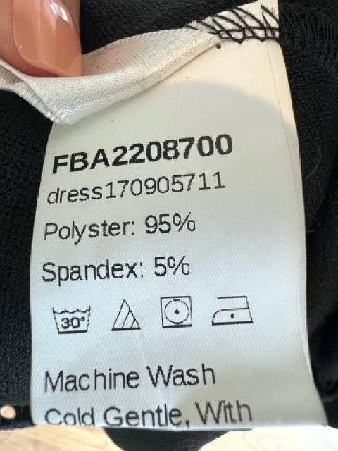 Fabric tag of No Brand Dress Size Small sold at Margaret's Fine Consignments, indicating 95% polyester, 5% spandex, and care instructions.